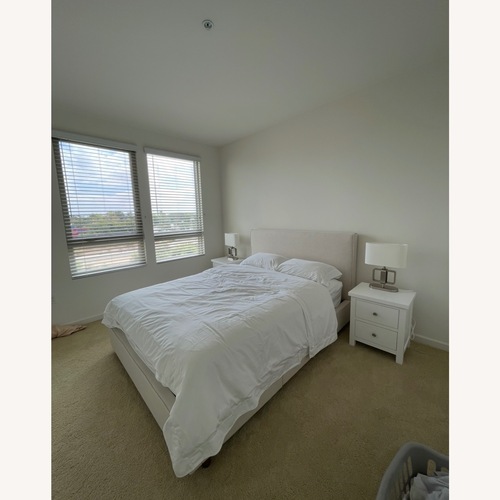 Used Living Spaces Light Brown Queen Bed for sale on AptDeco