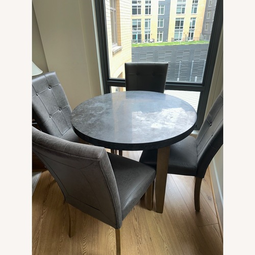 Used Steve Silver Co. Dark Gray Wood/Marble Dining Set for sale on AptDeco