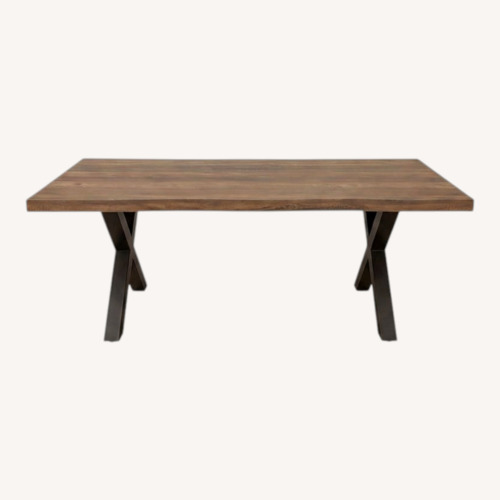 Used Dark Brown Wood Dining Table for sale on AptDeco