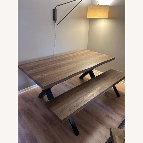 Used Dark Brown Wood Dining Table for sale on AptDeco