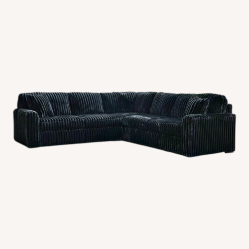 Used Ashley Furniture Black 3+ Piece Sectional for sale on AptDeco