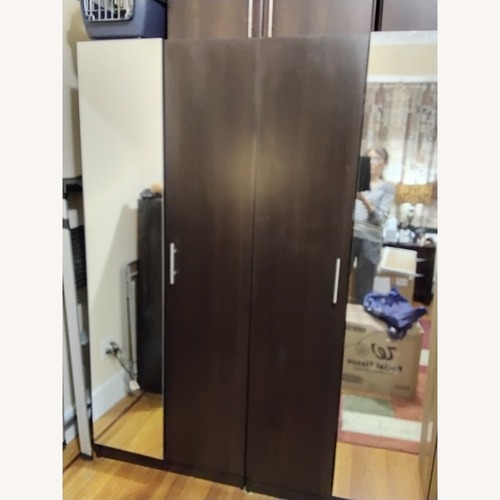 Used Dark Brown Wood Armoire/wardrobe for sale on AptDeco