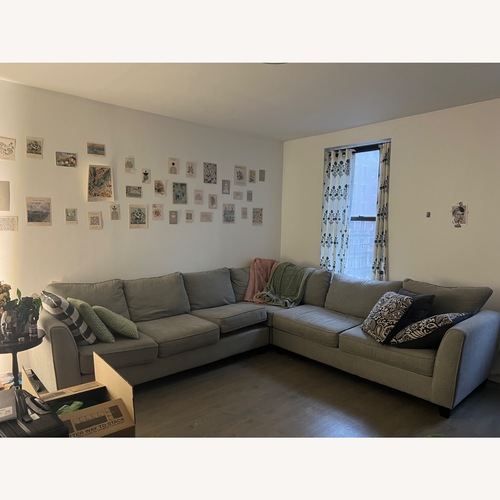 Used Raymour & Flanigan Light Gray 2 Piece Sectional for sale on AptDeco