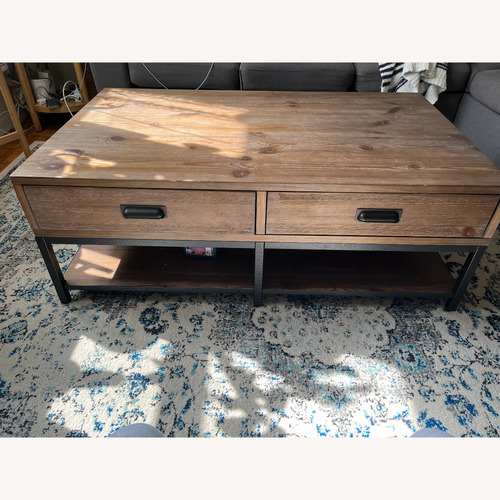 Used Wood and Metal Coffee Table with Drawers for sale on AptDeco