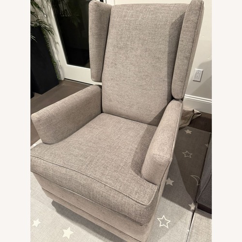 Used Pottery Barn Wingback Recliner Swivel Glider for sale on AptDeco