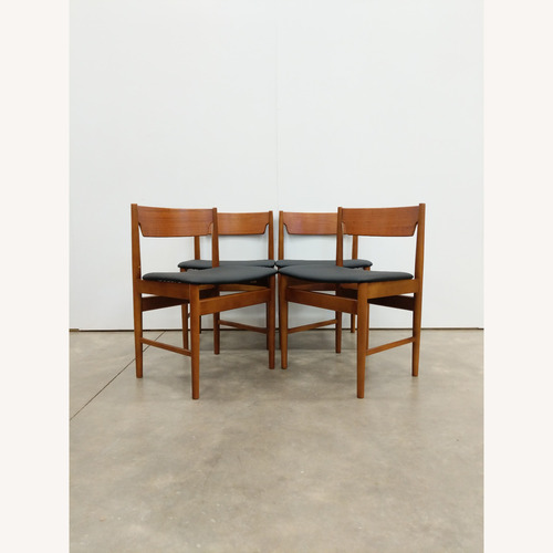 Used 4 Vintage Edmund Homa Polish MCM Dining Chairs for sale on AptDeco