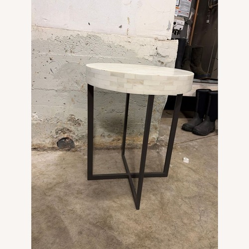 Used West Elm Bone Side Table on Iron Base for sale on AptDeco