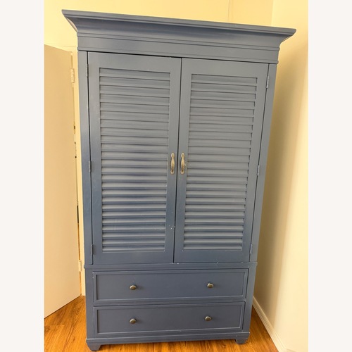 Used Ethan Allen Blue Wood Armoire for sale on AptDeco