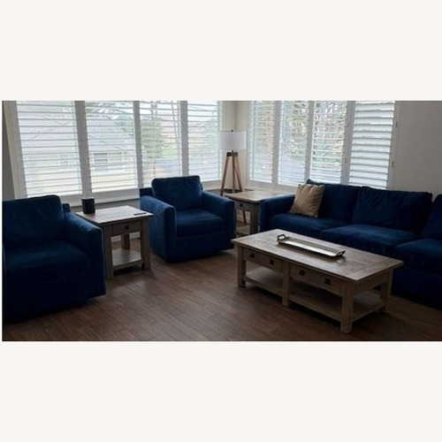 Used Crate & Barrel Blue Velvet Lounge Swivel Chair for sale on AptDeco