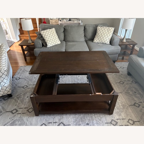 Used Dark Brown Multi Functional Coffee Table for sale on AptDeco