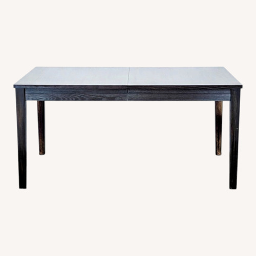 Used Crate & Barrel Wood Dining Table for sale on AptDeco