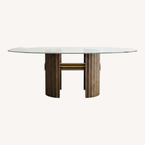 Used Custom Oval Glass Dining Table for sale on AptDeco