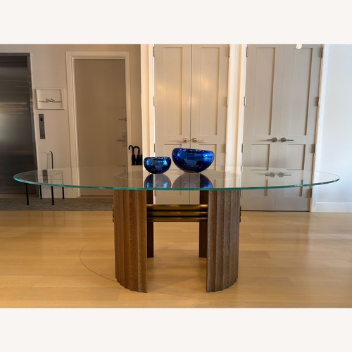 Used Custom Oval Glass Dining Table for sale on AptDeco