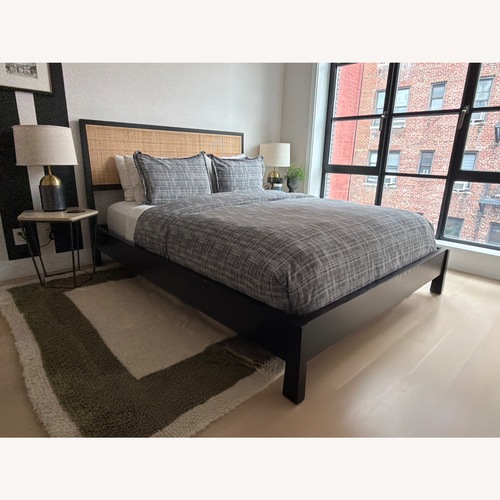 Used Black Wood Queen Bed for sale on AptDeco