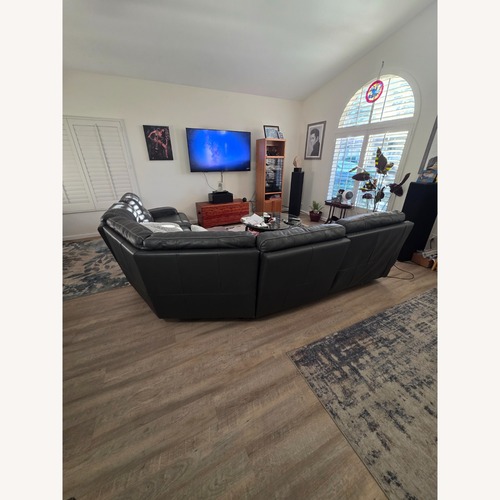 Used Italian Leather Duel Electric Recliners  for sale on AptDeco