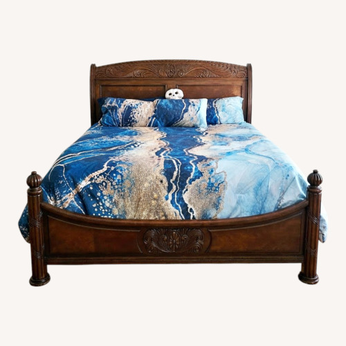 Used Dark Brown Wood King Bed for sale on AptDeco