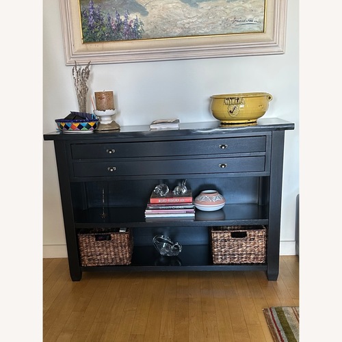 Used Pottery Barn Monroe Black Wood Sideboard for sale on AptDeco