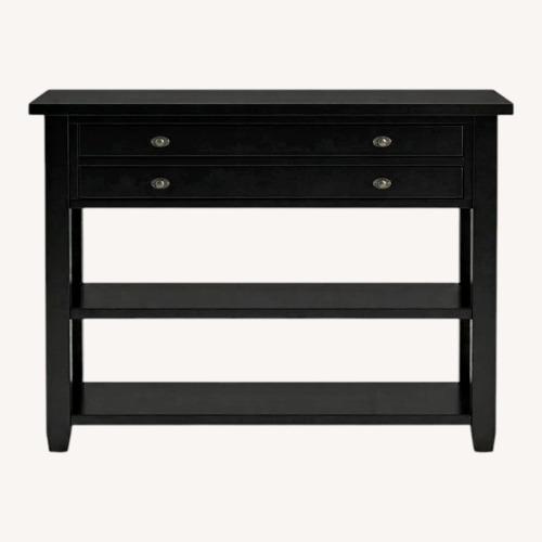 Used Pottery Barn Monroe Black Wood Sideboard for sale on AptDeco