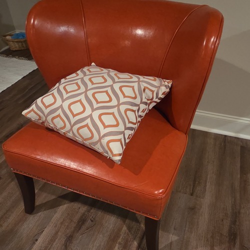 Used Orange Leather Accent Chair for sale on AptDeco