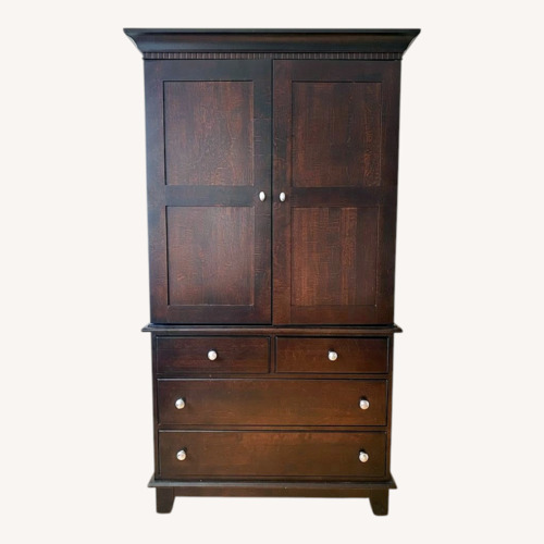 Used Cresent Furniture Dark Brown Wood Armoire for sale on AptDeco
