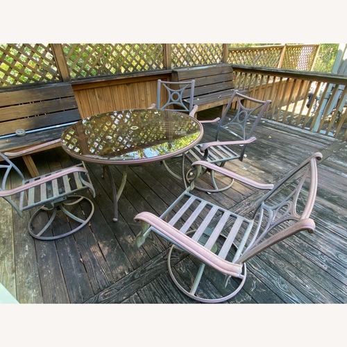 Used Round Patio Table and 4 Swivel Chairs for sale on AptDeco