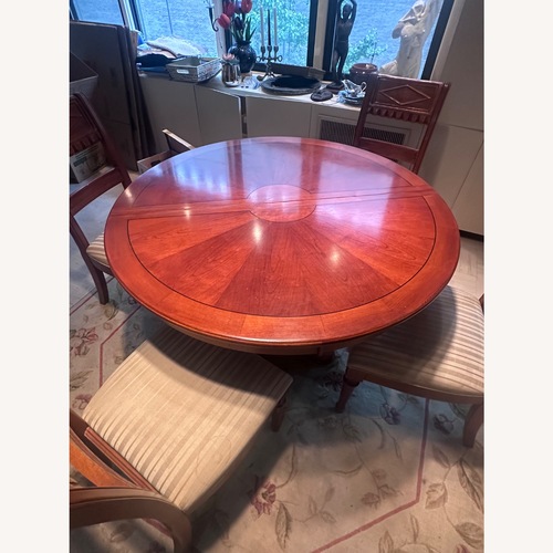 Used Vintage/Antique Red Wood Dining Table for sale on AptDeco