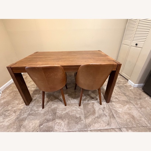 Used West Elm Light Brown Wood Dining Table for sale on AptDeco