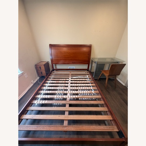 Used Wood Queen Bed for sale on AptDeco