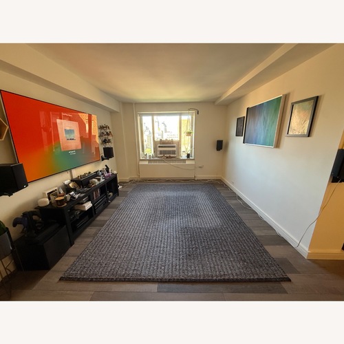 Used Crate & Barrel Prato Dark Gray Area Rug 8' x 10' for sale on AptDeco