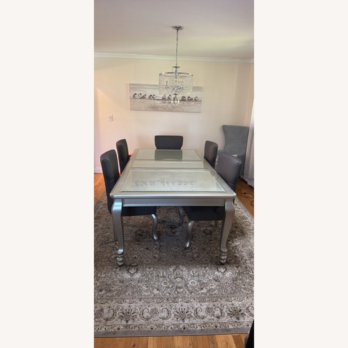 Used Ashley Furniture Silver Dining Table for sale on AptDeco