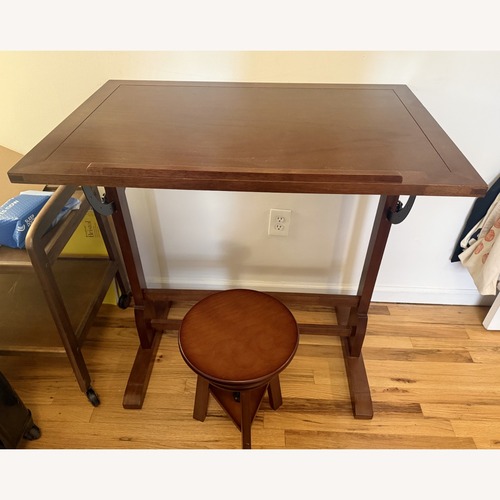 Used Dark Brown Wood Desk for sale on AptDeco