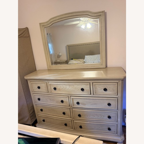 Used Ashley Furniture Light Brown Wood Dresser for sale on AptDeco