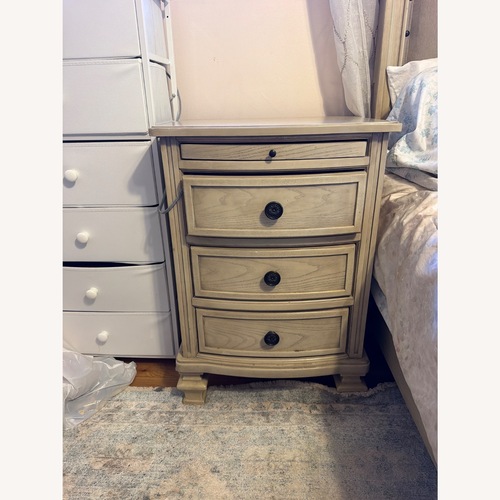 Used Ashley Furniture Light Brown Wood Nightstand for sale on AptDeco