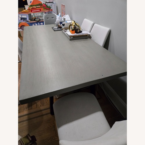 Used West Elm Ashton Lava Stone Dining Table for sale on AptDeco