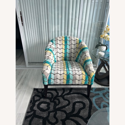 Used Pattern Accent Chair with 4 Matching Pillows  for sale on AptDeco