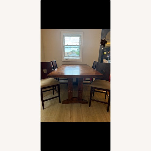 Used Bob's Discount Furniture Dark Brown Dining Table for sale on AptDeco