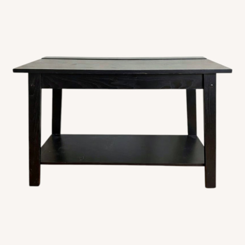Used Black Wood Coffee Table for sale on AptDeco