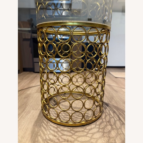 Used Willa Arlo Interiors Gold Glass Dining Table for sale on AptDeco