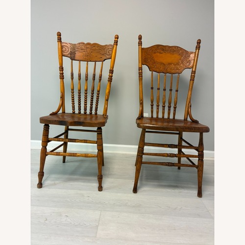 Used Dark Brown Wood Dining Chair for sale on AptDeco