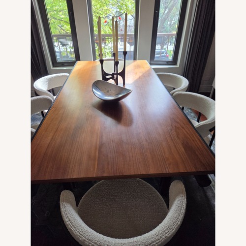 Used Dark Brown Wood Dining Table for sale on AptDeco