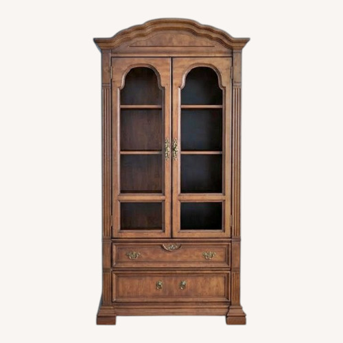 Used Dark Brown Wood Armoire for sale on AptDeco