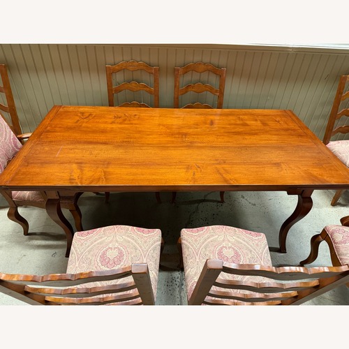 Used Light Brown Wood Dining Table for sale on AptDeco