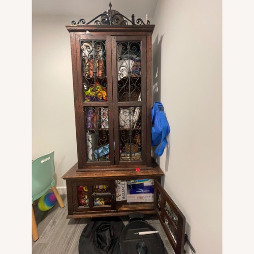 Used Vintage/Antique Dark Brown Wood Armoire for sale on AptDeco