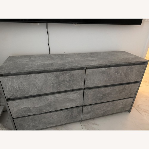 Used Overstock Light Gray Wood Dresser for sale on AptDeco