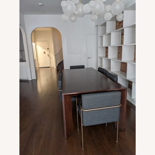 Used West Elm Dark Brown Wood Dining Table for sale on AptDeco