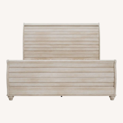 Used Ashley Furniture Wood King Bed for sale on AptDeco