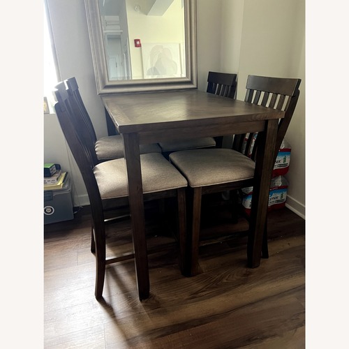 Used 5 Piece High Top Dining Set in Brown Oak Solid Wood for sale on AptDeco