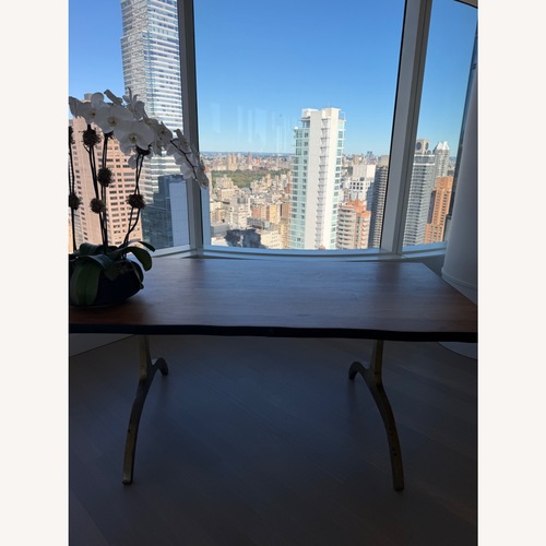 Used Natural Wood Dining Table for sale on AptDeco