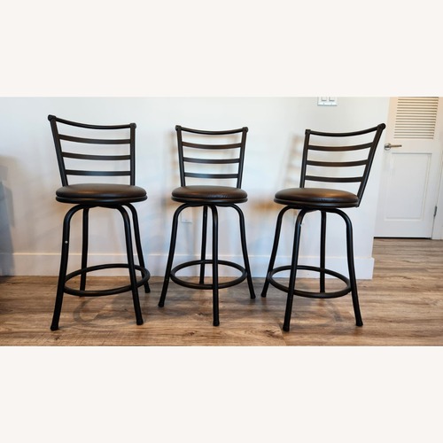 Used Black Metal Stool w Leather Seating for sale on AptDeco