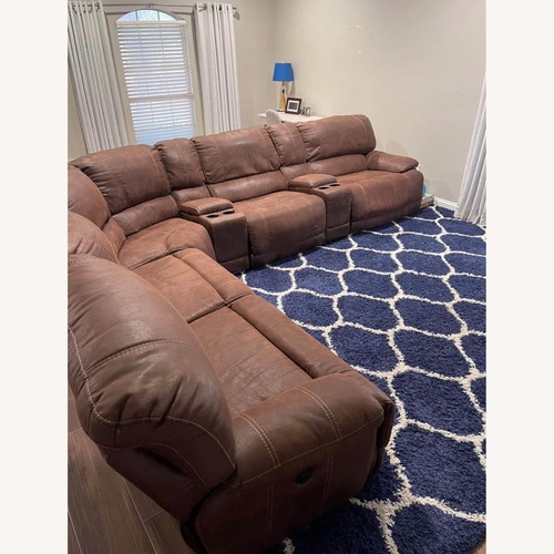 Used Dark Brown Leather 7 Piece Reclining Sectional for sale on AptDeco